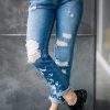 Torn Blue Jeans - Thumbnail Image 1